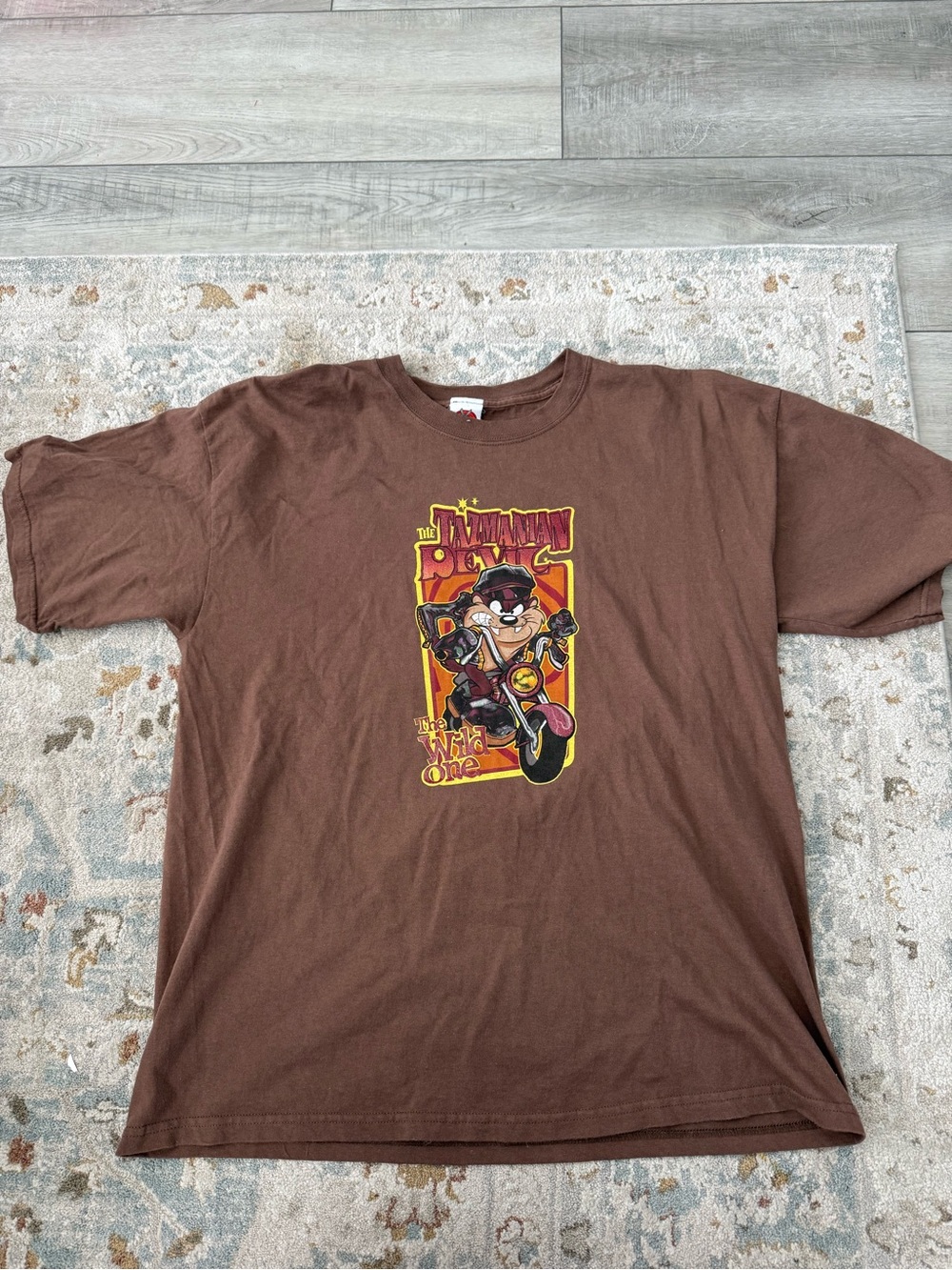 Warner Bros. Looney Tunes Brown Tee with Red and Yellow Logo